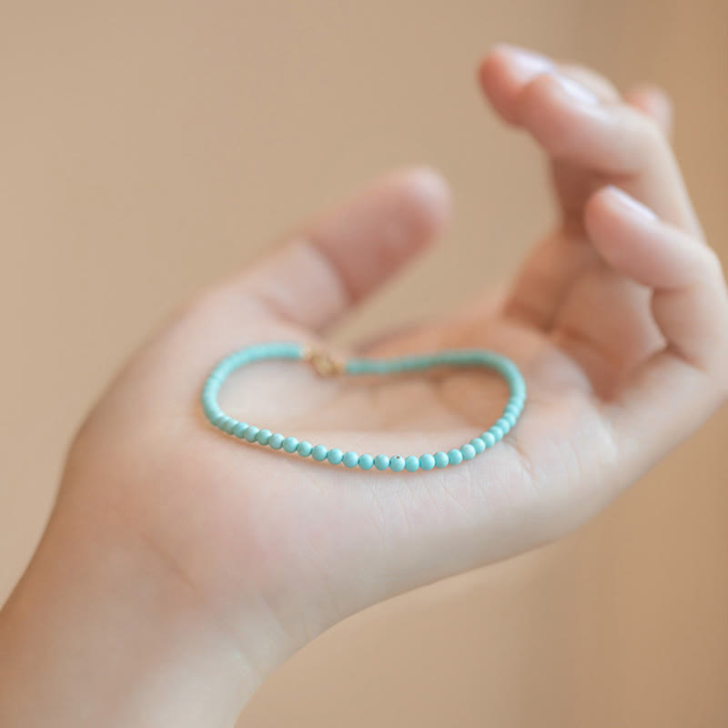 Bracelet Sagesse en turquoise de 2 mm et or 14 carats