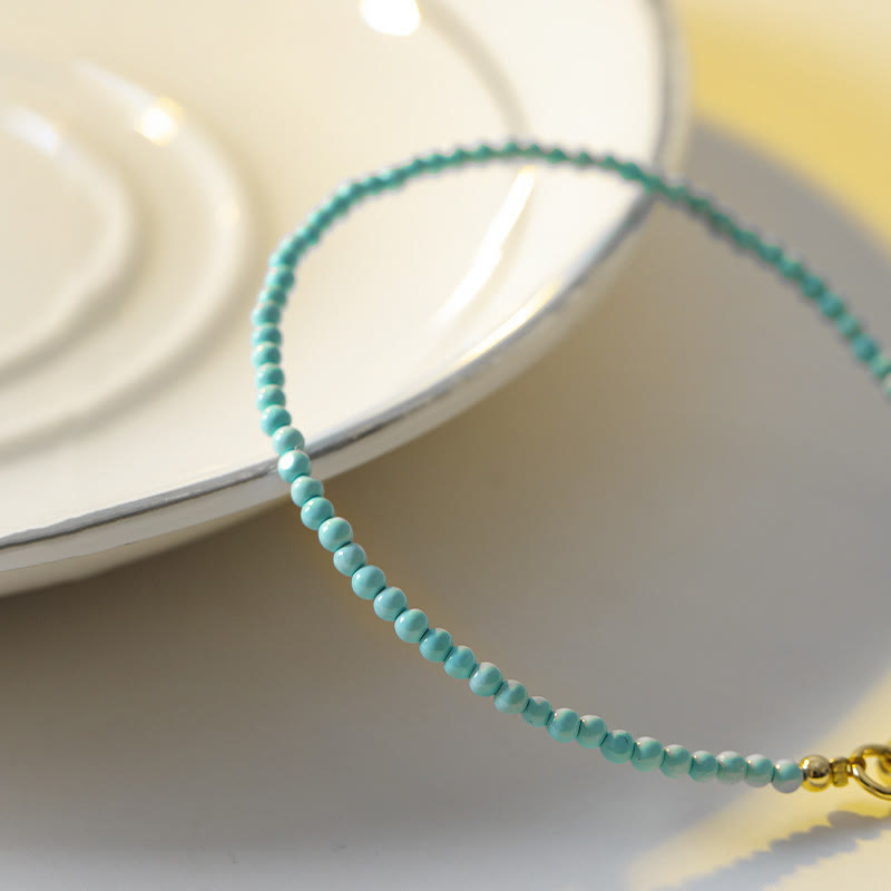 Bracelet Sagesse en turquoise de 2 mm et or 14 carats