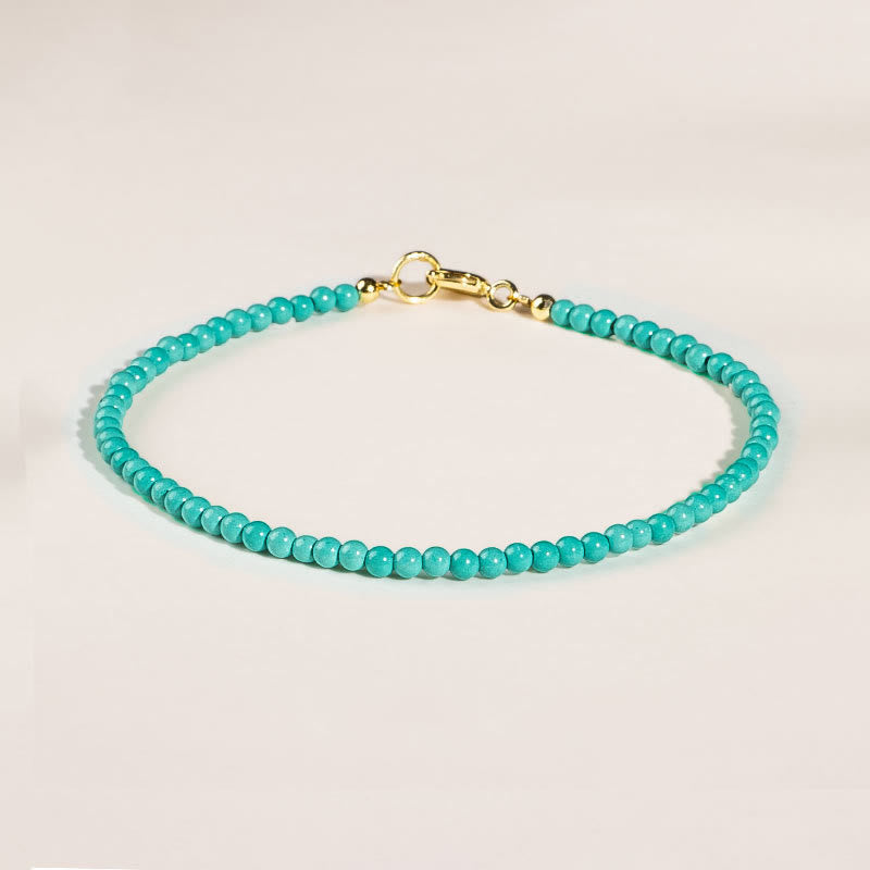 Bracelet Sagesse en turquoise de 2 mm et or 14 carats
