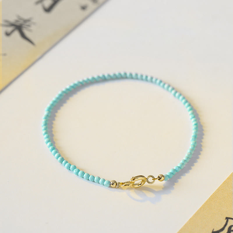 Bracelet Sagesse en turquoise de 2 mm et or 14 carats
