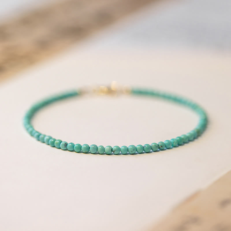 Bracelet Sagesse en turquoise de 2 mm et or 14 carats
