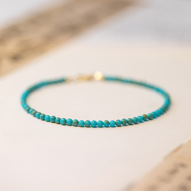 Bracelet Sagesse en turquoise de 2 mm et or 14 carats