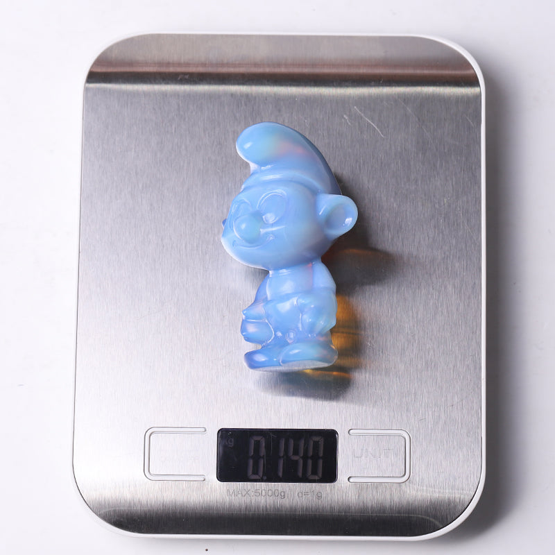 Figurine sculptée en cristal d'opalite bleue de 3,2 pouces