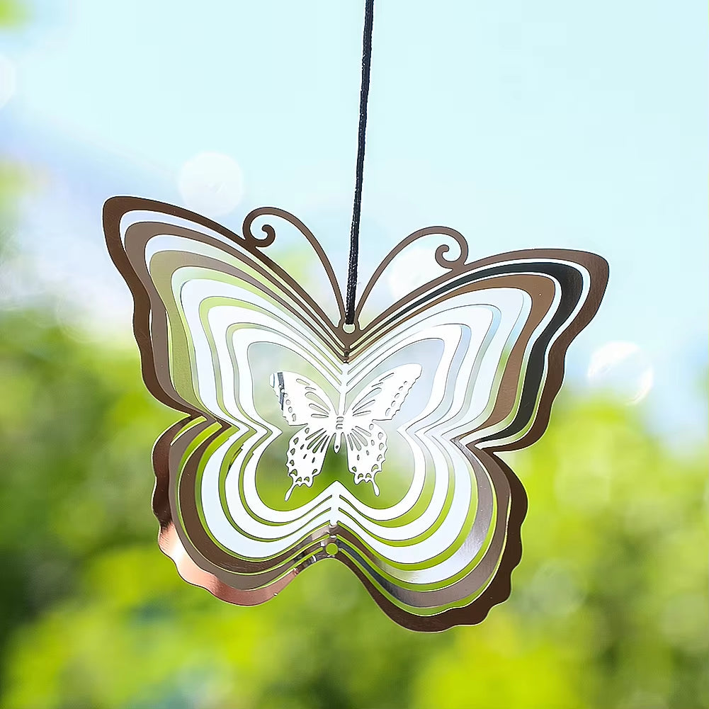 Metallic butterfly wind spinner featuring a layered spiral design for outdoor decor