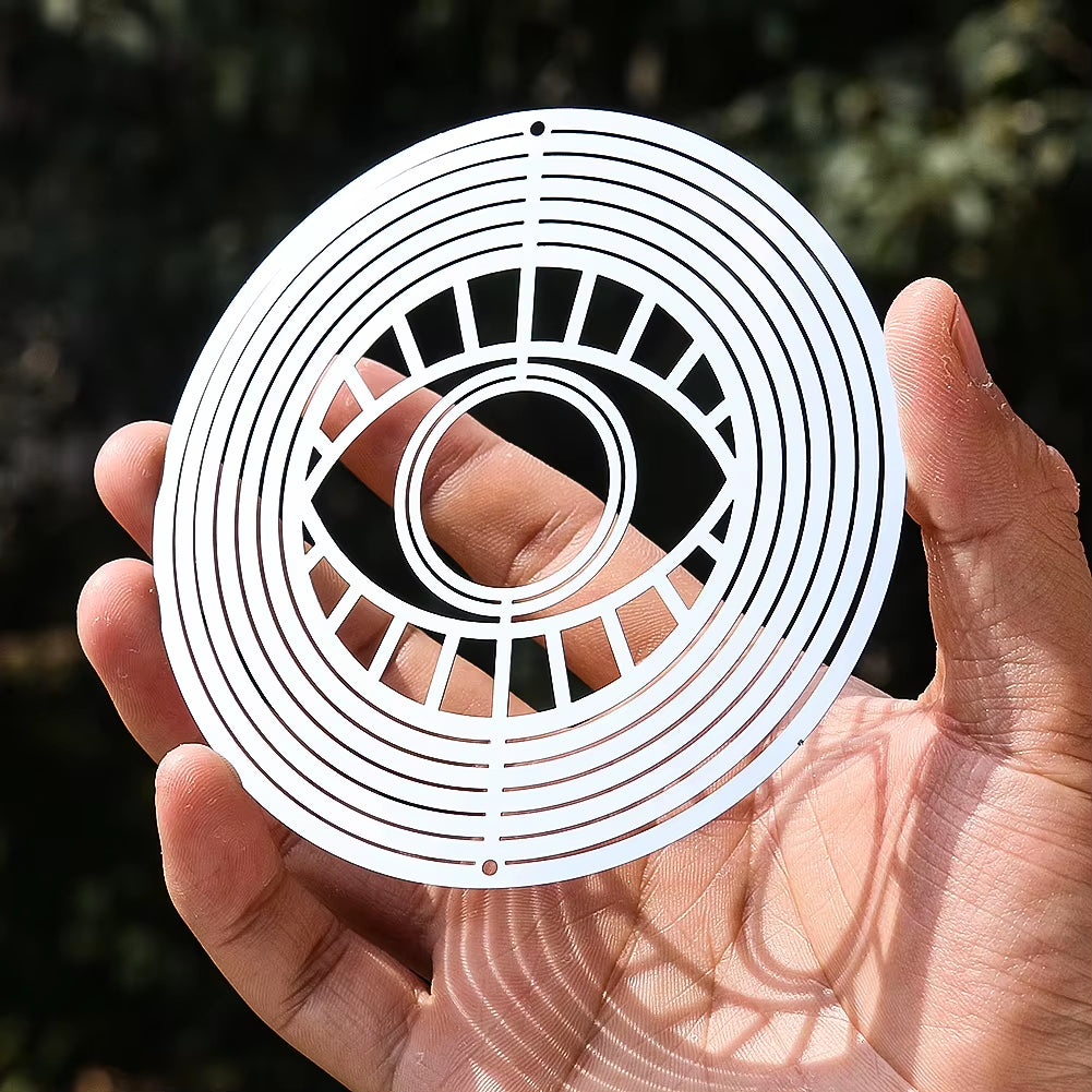 White circular paper cutout with concentric rings for 3D Metal Turkish Eye Wind Spinner