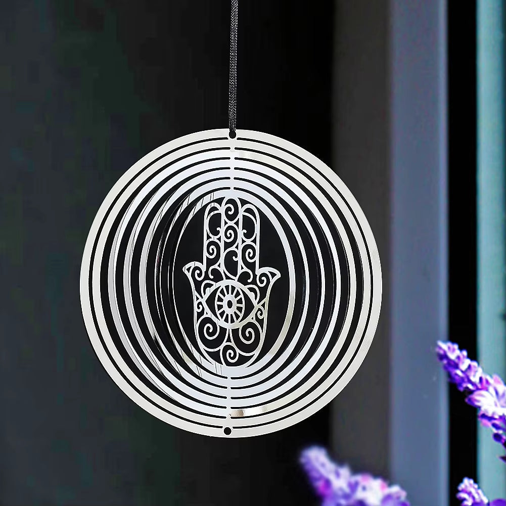 Circular wind spinner featuring a Hamsa hand design in a 3D Stainless Steel Garden Amulet