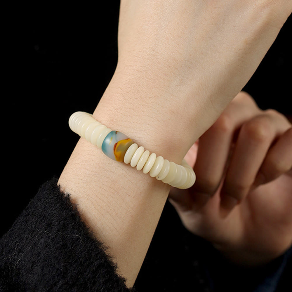 Bracelet Mala à pampilles de sagesse en graines de Bodhi blanches 3 x 10 mm