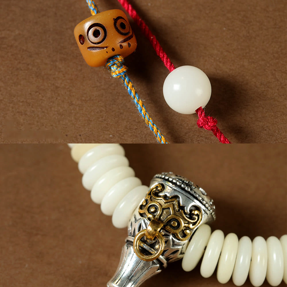 Bracelet Mala à pampilles de sagesse en graines de Bodhi blanches 3 x 10 mm