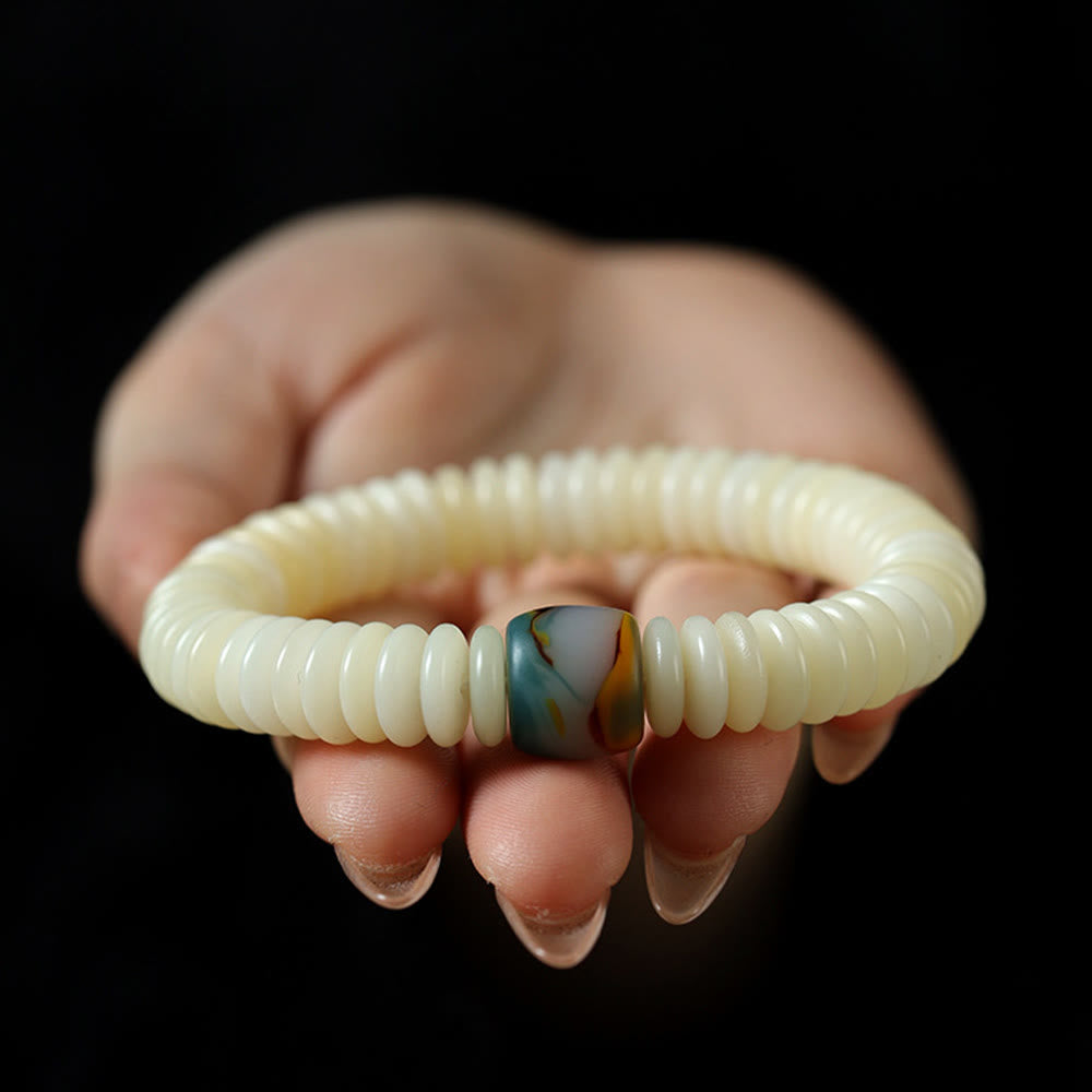 Bracelet Mala à pampilles de sagesse en graines de Bodhi blanches 3 x 10 mm