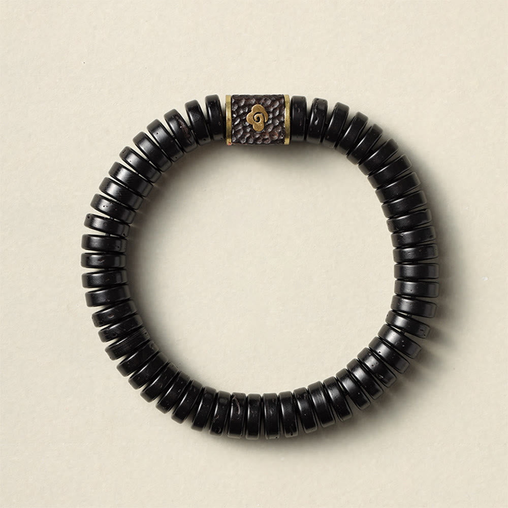 Bracelet en coquille de noix de coco 3x8 mm pour des intentions positives