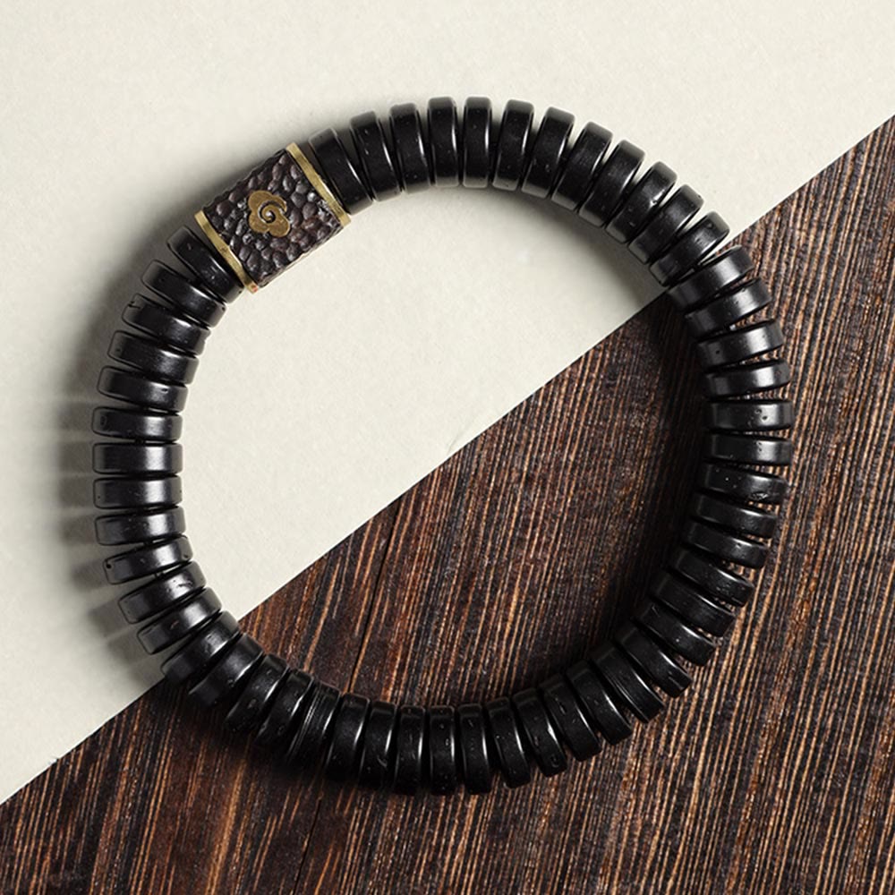 Bracelet en coquille de noix de coco 3x8 mm pour des intentions positives