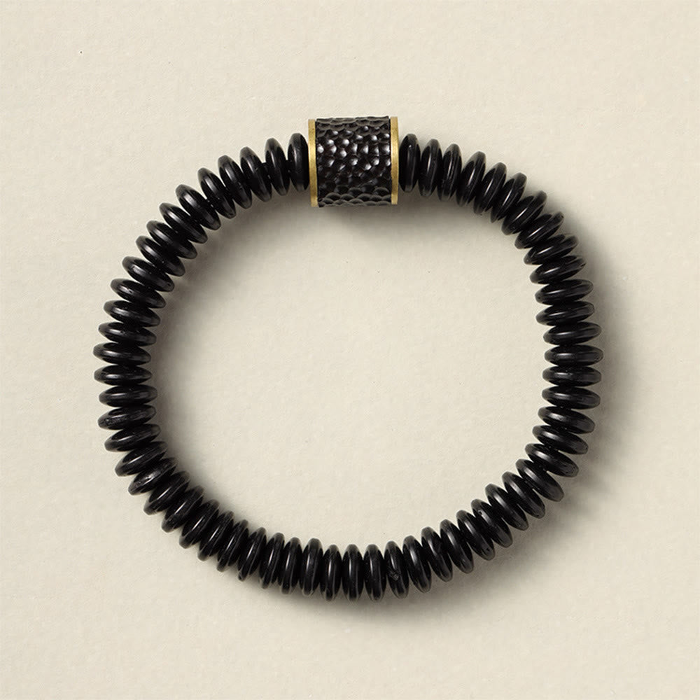 Bracelet en coquille de noix de coco 3x8 mm pour des intentions positives