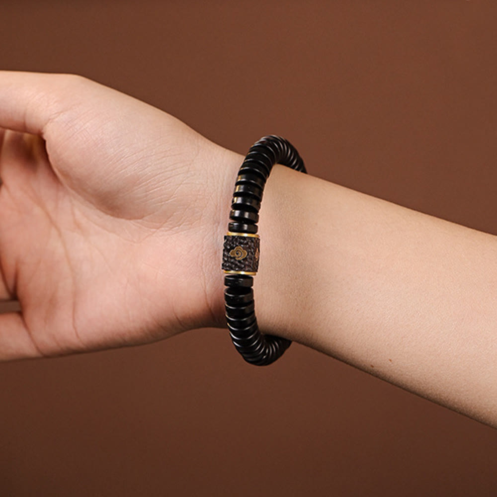 Bracelet en coquille de noix de coco 3x8 mm pour des intentions positives