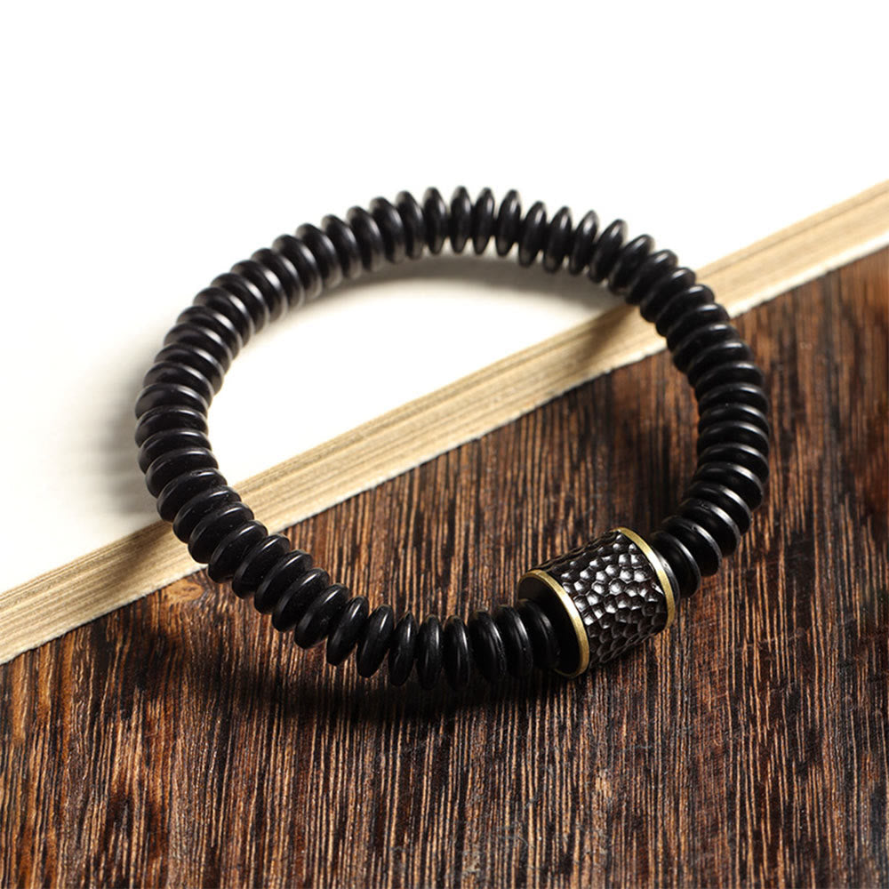 Bracelet en coquille de noix de coco 3x8 mm pour des intentions positives