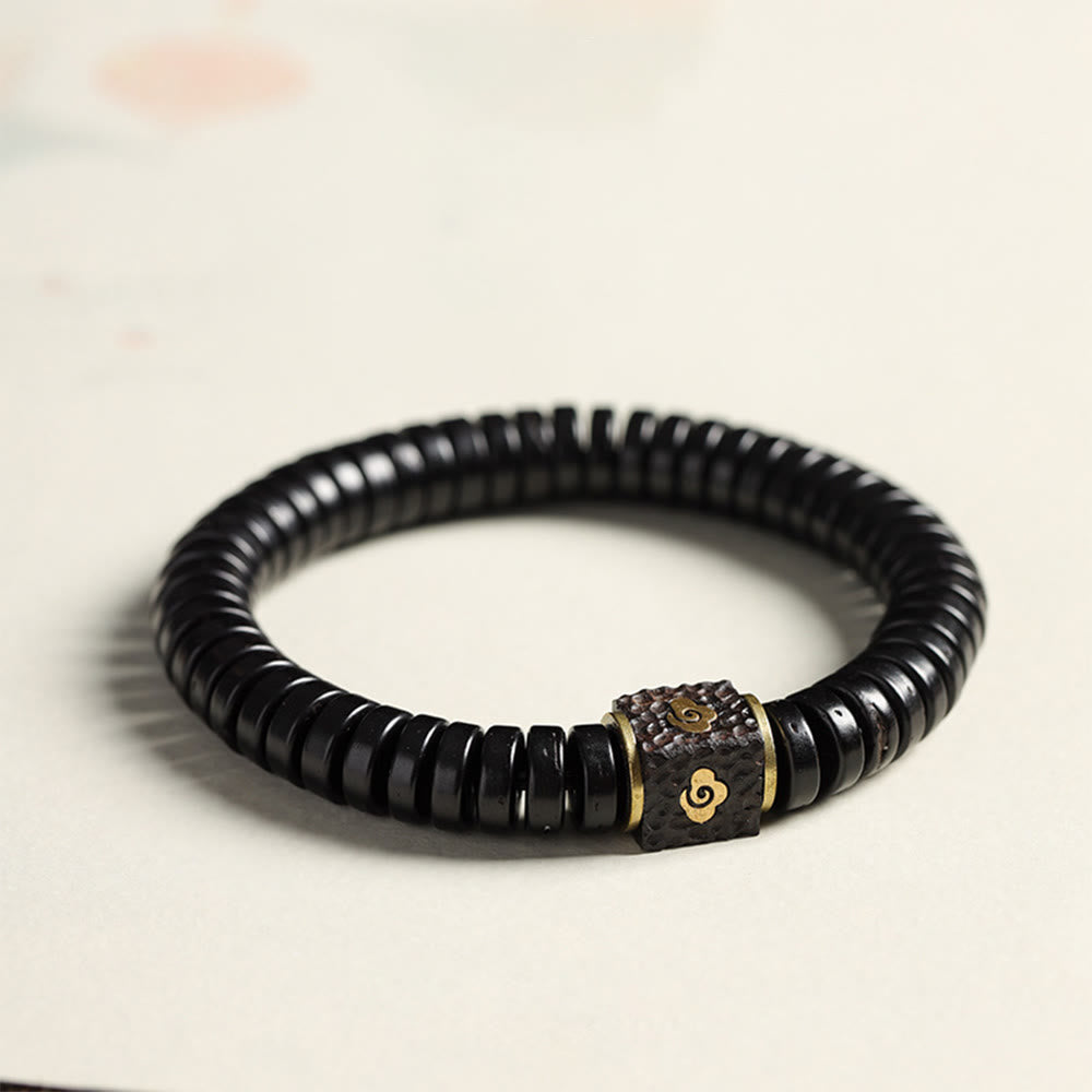 Bracelet en coquille de noix de coco 3x8 mm pour des intentions positives