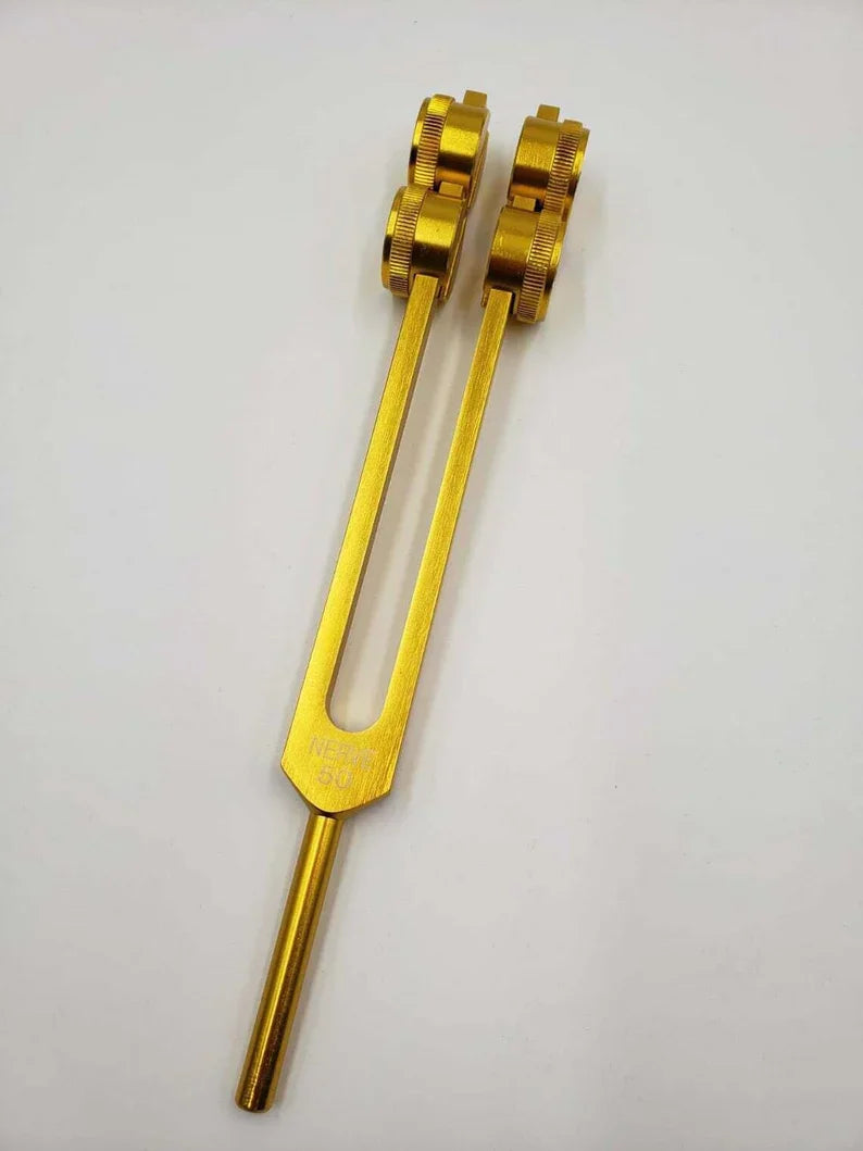 Golden tuning fork with dual prongs for 50 Hz nerve healing therapy