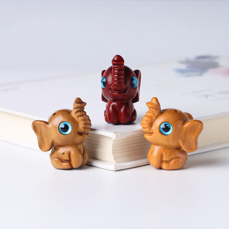 Mini Elephant Carved Decoration in Sandalwood for Protection & Luck