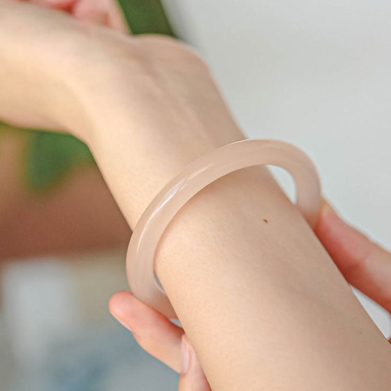 Bracelet d'amour-propre en jade rose de 52 mm pour l'harmonie et la paix