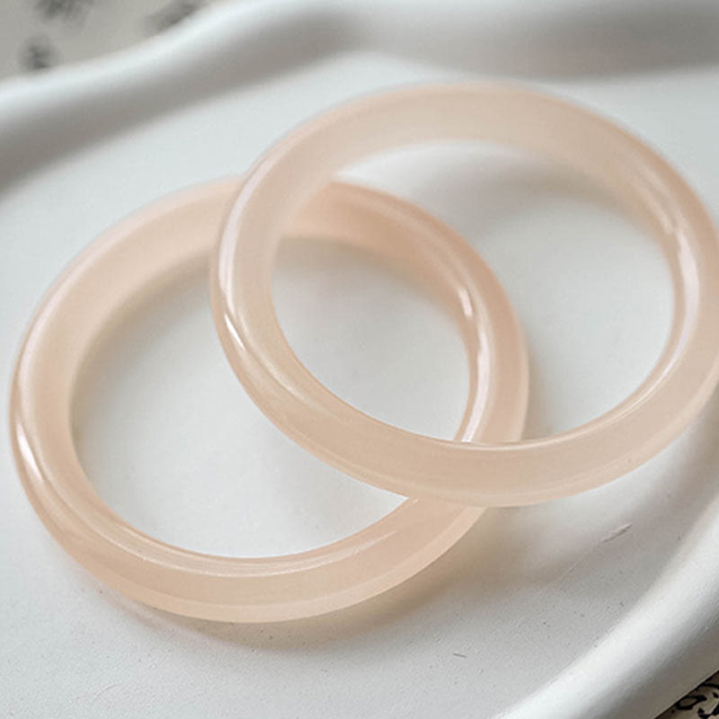 Bracelet d'amour-propre en jade rose de 52 mm pour l'harmonie et la paix