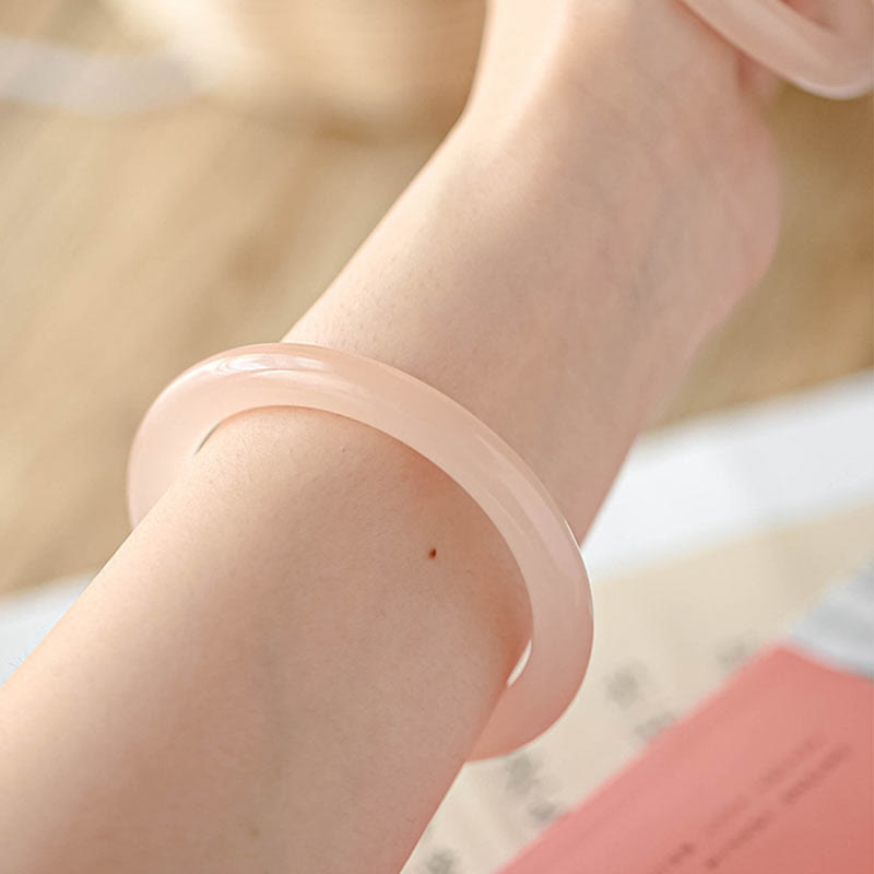 Bracelet d'amour-propre en jade rose de 52 mm pour l'harmonie et la paix