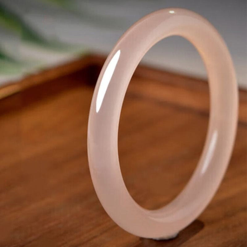 Bracelet d'amour-propre en jade rose de 52 mm pour l'harmonie et la paix