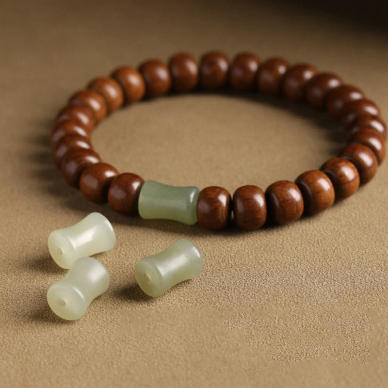 Bracelet de protection en bois d'Abelia Biflora et jade Hetian 6*8 mm