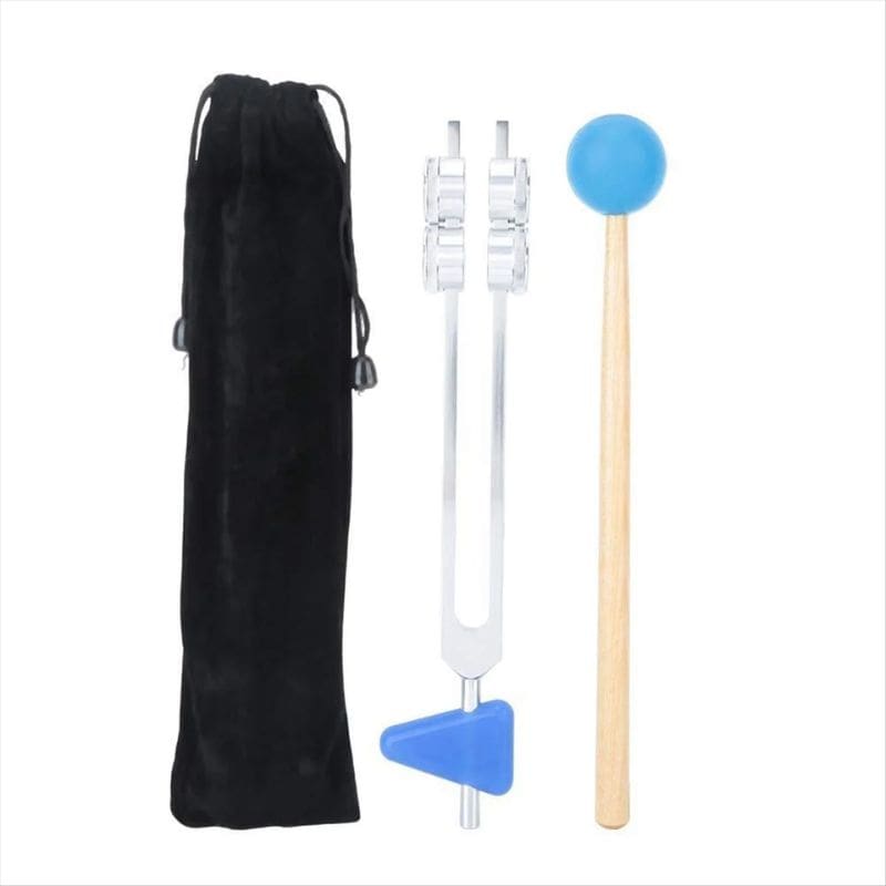 Tuning fork with black velvet bag and blue rubber mallet for 64 Hz healing