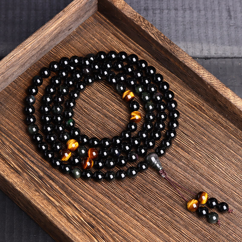 Bracelet Mala 108 perles en obsidienne noire œil de tigre de 6 mm