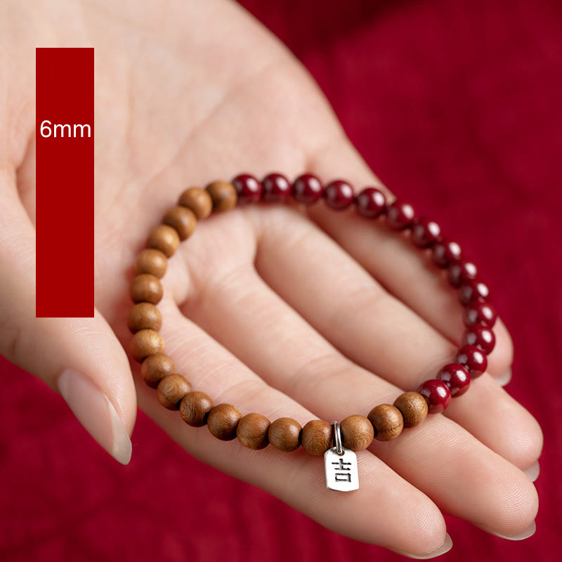 Bracelet en cinabre de 6 mm avec protection en bois de pêcher et argent sterling