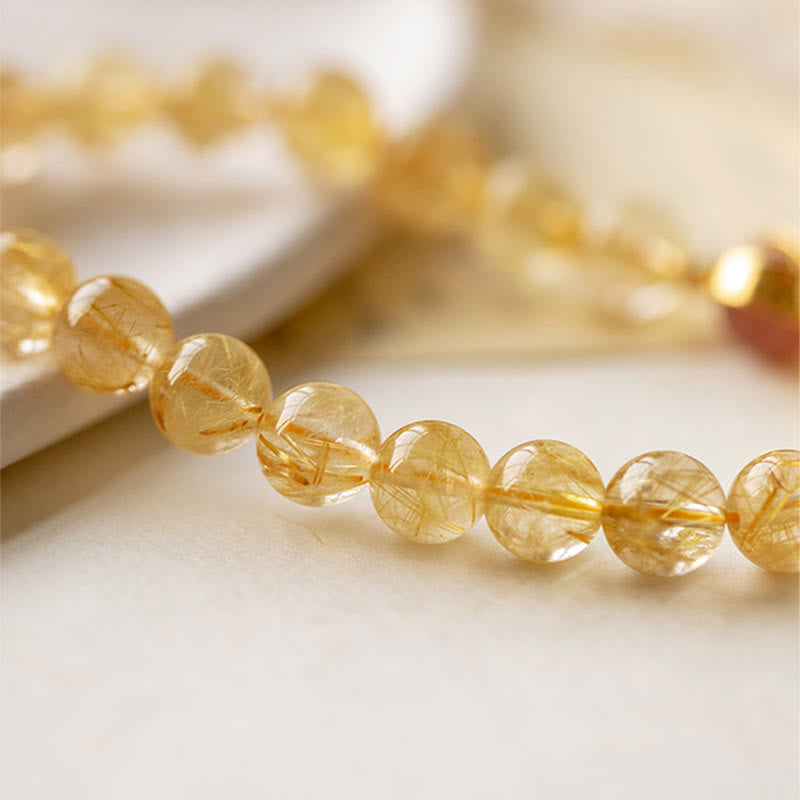 Bracelet de protection en quartz rutile doré de 6 mm et quartz fraise