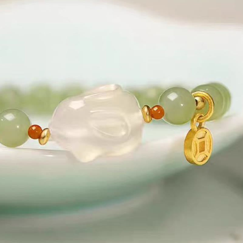 Bracelet en cuivre et jade Hetian de 6 mm pour la chance et la prospérité