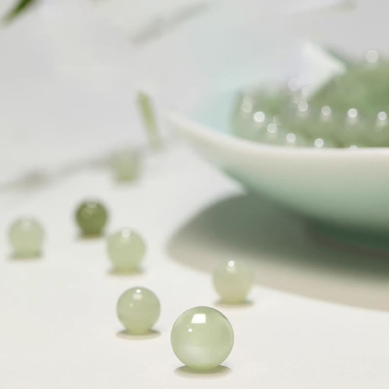 Bracelet en cuivre et jade Hetian de 6 mm pour la chance et la prospérité