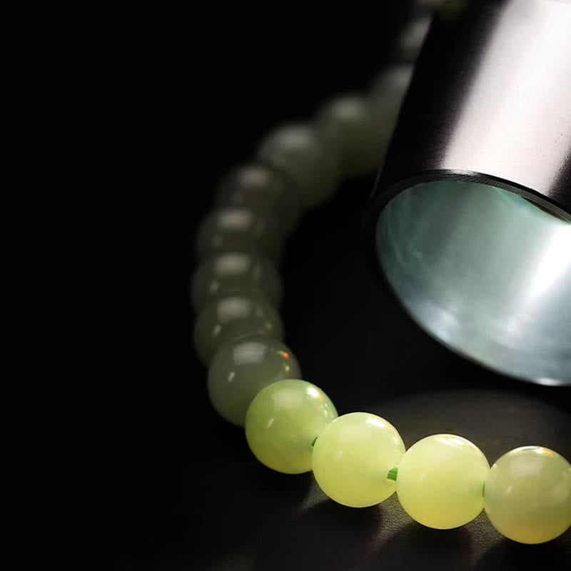 Bracelet en cuivre et jade Hetian de 6 mm pour la chance et la prospérité