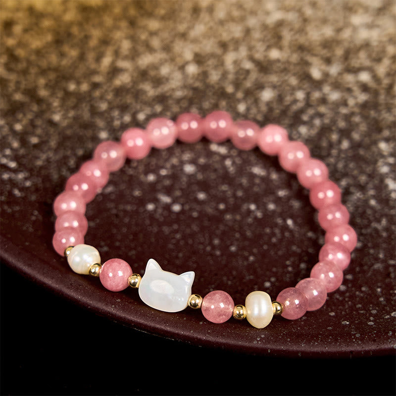 Bracelet en quartz fraise de 6 mm avec breloque chat ou lapin en perle