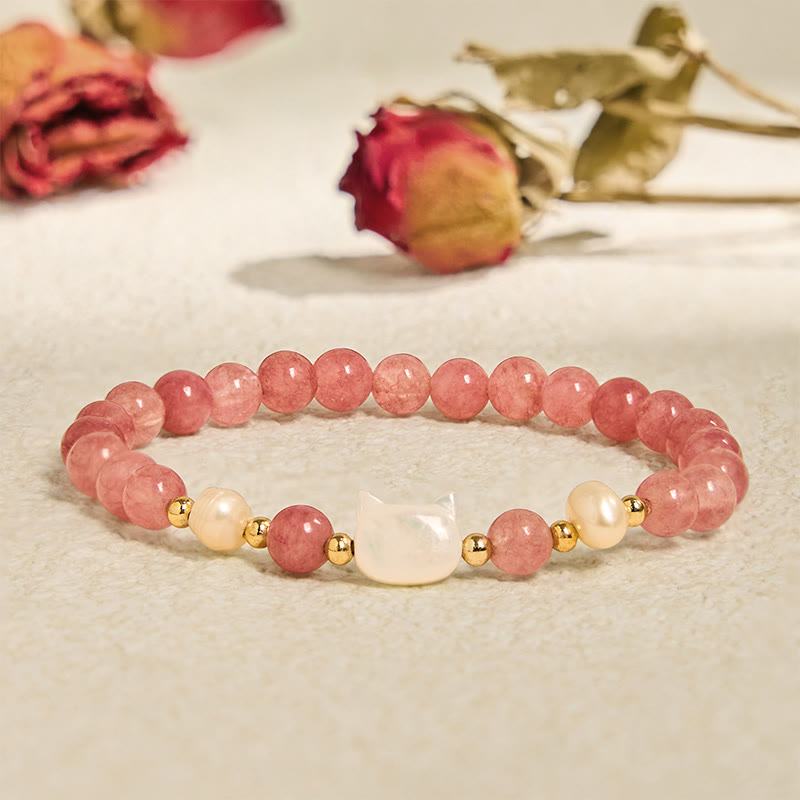 Bracelet en quartz fraise de 6 mm avec breloque chat ou lapin en perle
