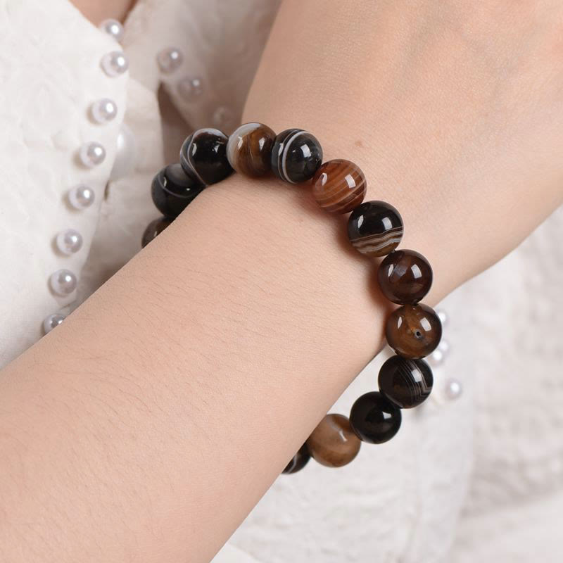 Bracelet tibétain en sardonyx de 6 mm pour la positivité et le courage