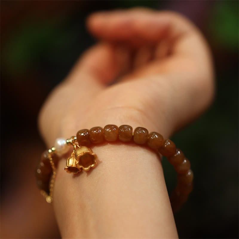 Bracelet à breloques en jade Hetian 6x7 mm pour la prospérité et l'abondance