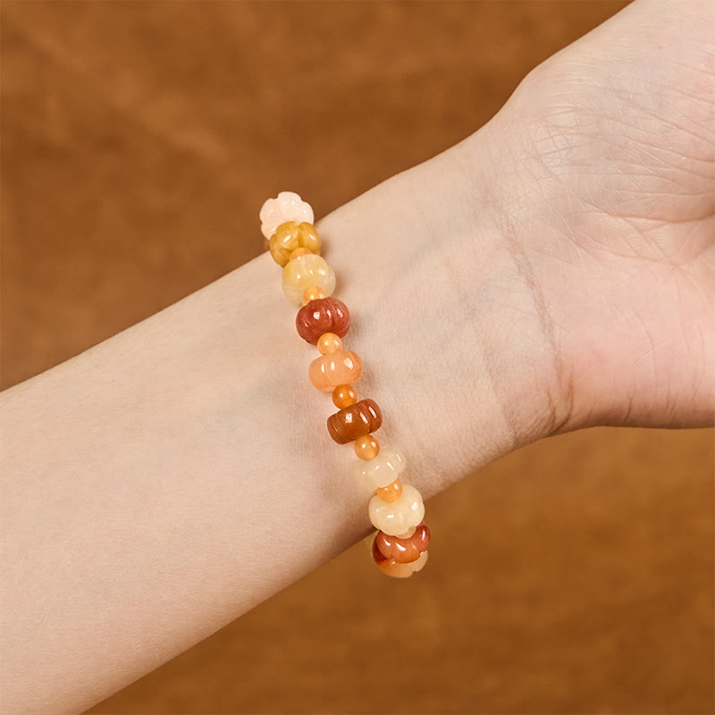 Bracelet en jade doré et soie 6x8 mm pour la richesse et la chance