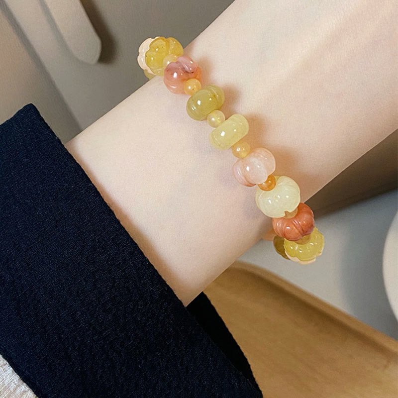 Bracelet en jade doré et soie 6x8 mm pour la richesse et la chance
