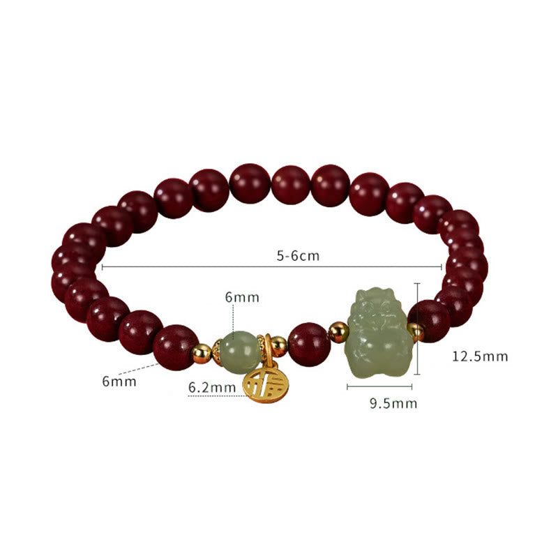 Sterling Silver Dragon Bracelet with Cinnabar & Jade Charms
