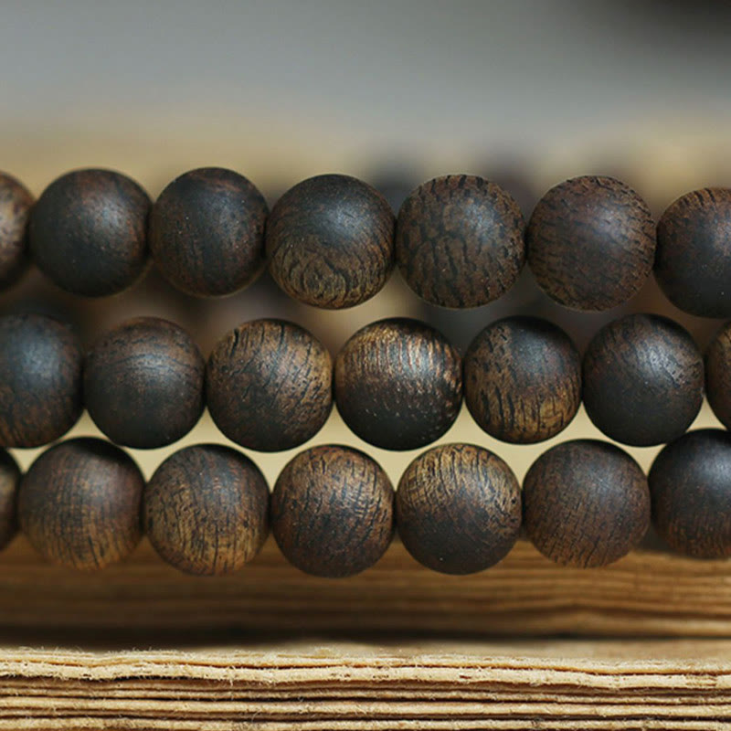 Bracelet Mala en bois d'agar de 7 mm pour la paix et la force