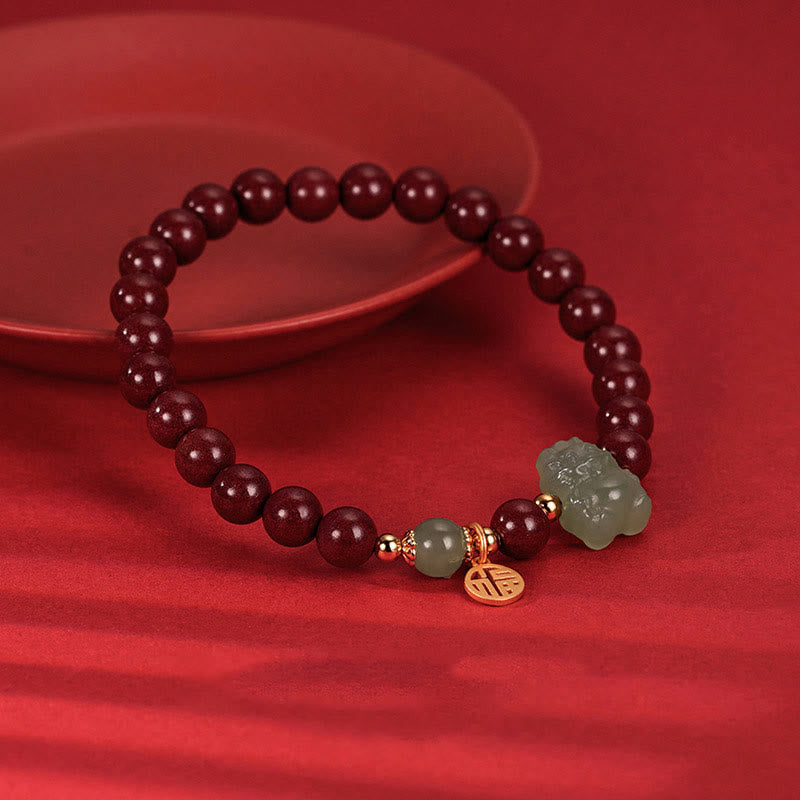 Sterling Silver Dragon Bracelet with Cinnabar & Jade Charms