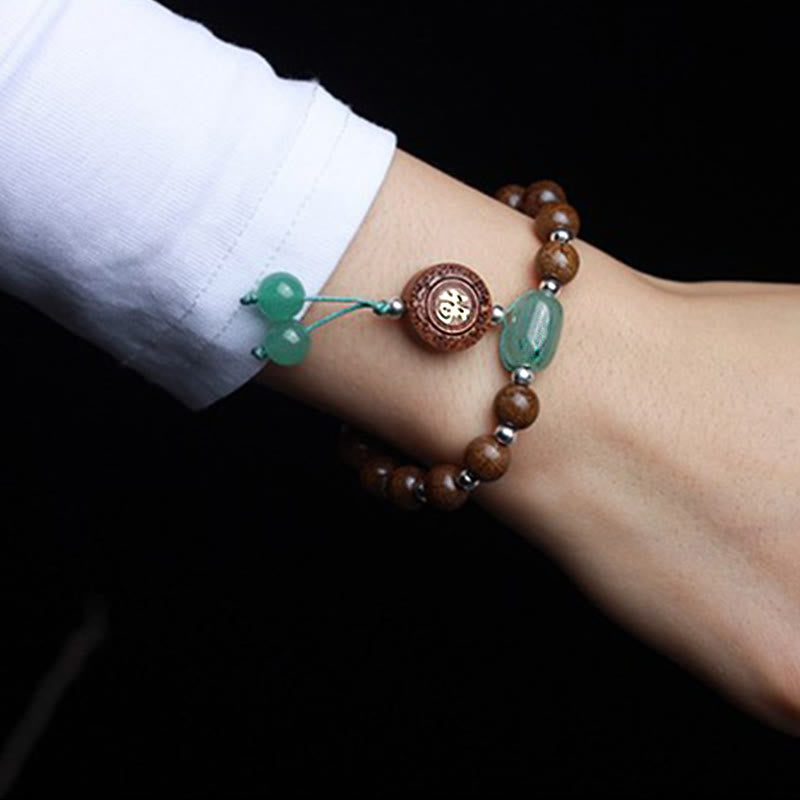 Bracelet de protection Om Mani Padme Hum en bois d'Abelia Biflora de 8 mm
