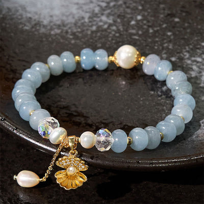 Bracelet de guérison en coquillage de perles d'aigue-marine de 8 mm pour la sérénité