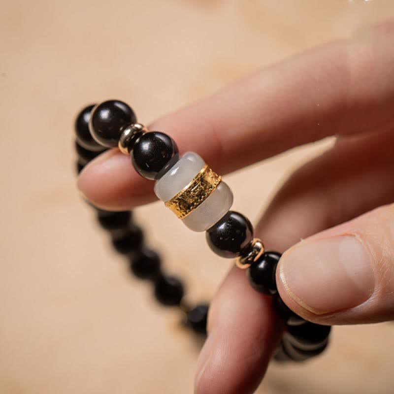 Bracelet de force Om Mani Padme Hum en jade obsidienne noire de 8 mm