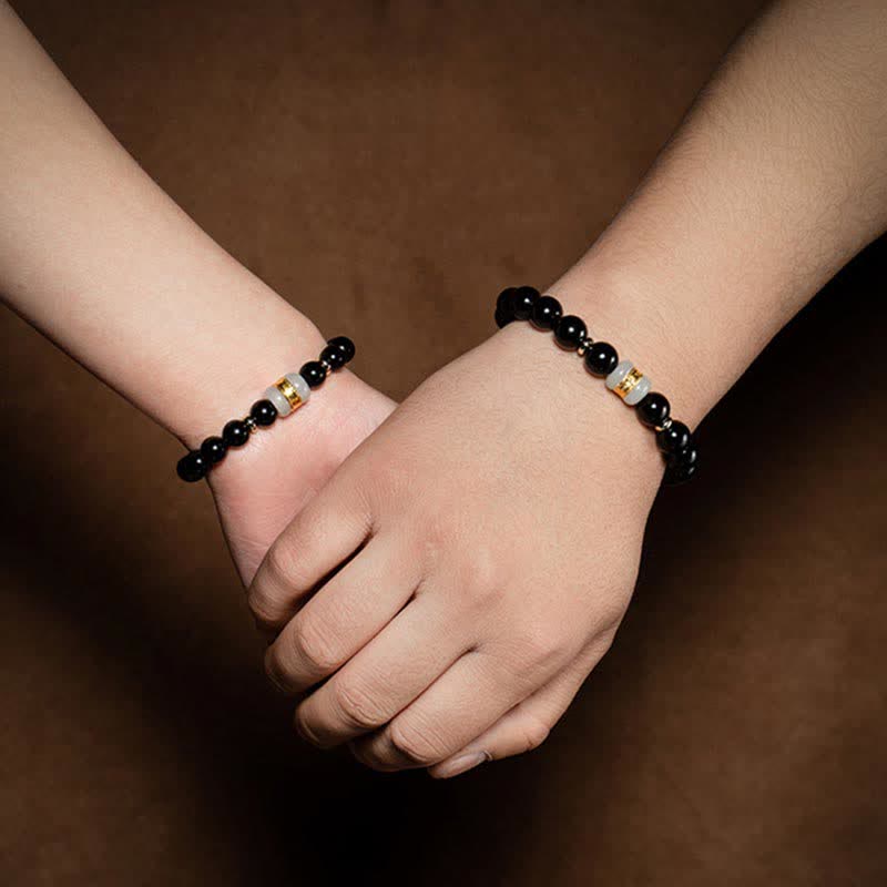 Bracelet de force Om Mani Padme Hum en jade obsidienne noire de 8 mm