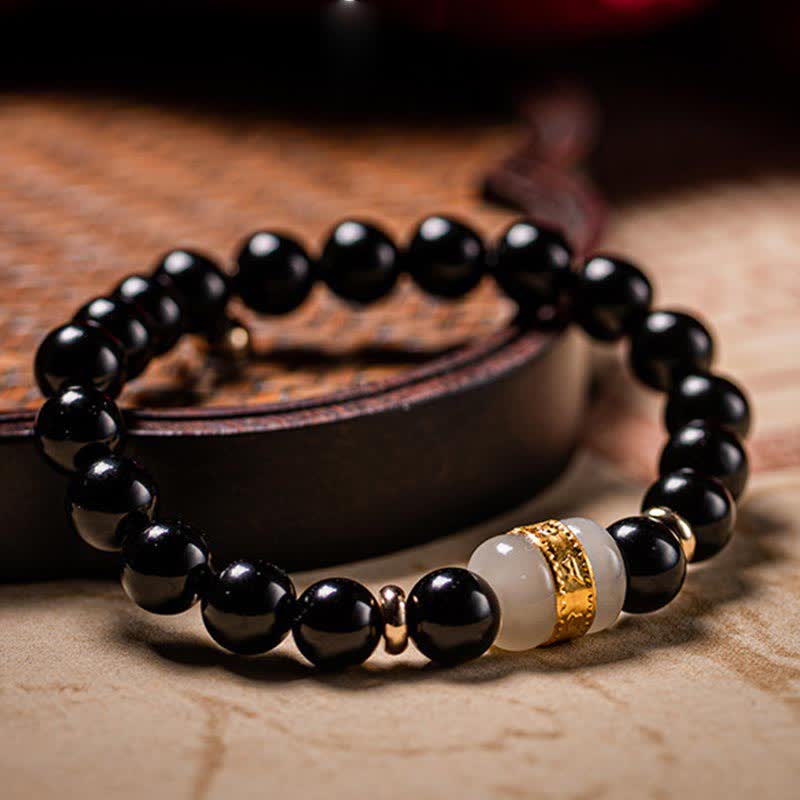 Bracelet de force Om Mani Padme Hum en jade obsidienne noire de 8 mm