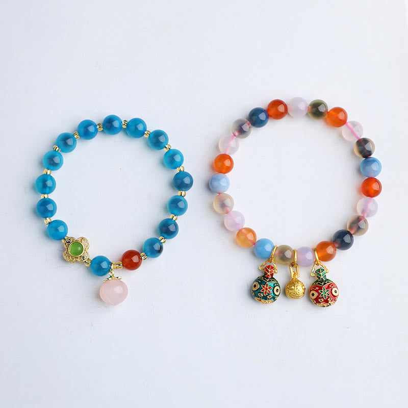 Bracelet en agate bonbon de 8 mm avec breloques dorées en forme de bête avaleuse pour l'harmonie