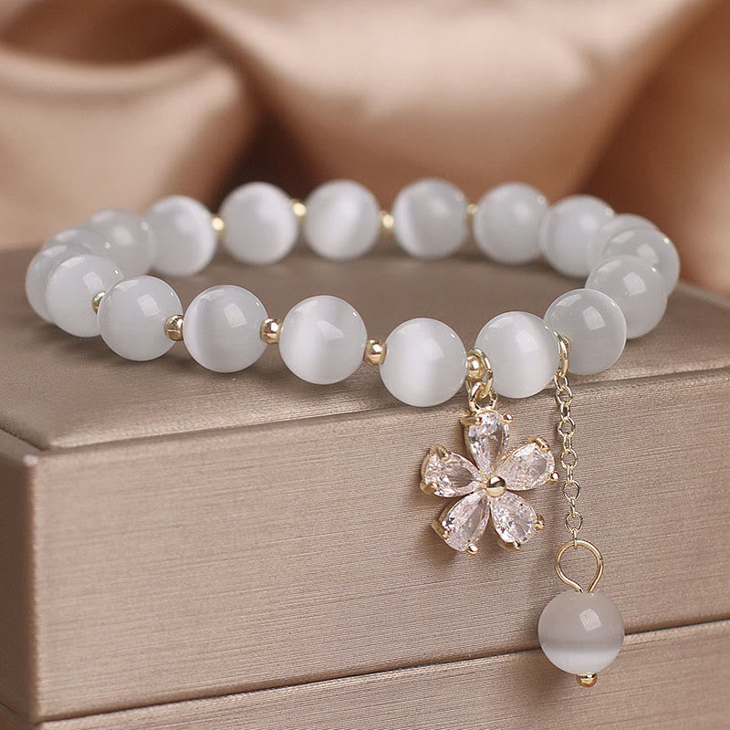 Bracelet à breloques œil de chat 8 mm avec fleur de paix et de soutien