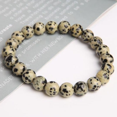 Bracelet en cristal dalmatien de 8 mm pour la guérison et la protection